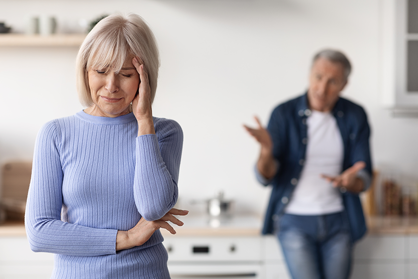 Mature lady crying, having quarrel with her husband