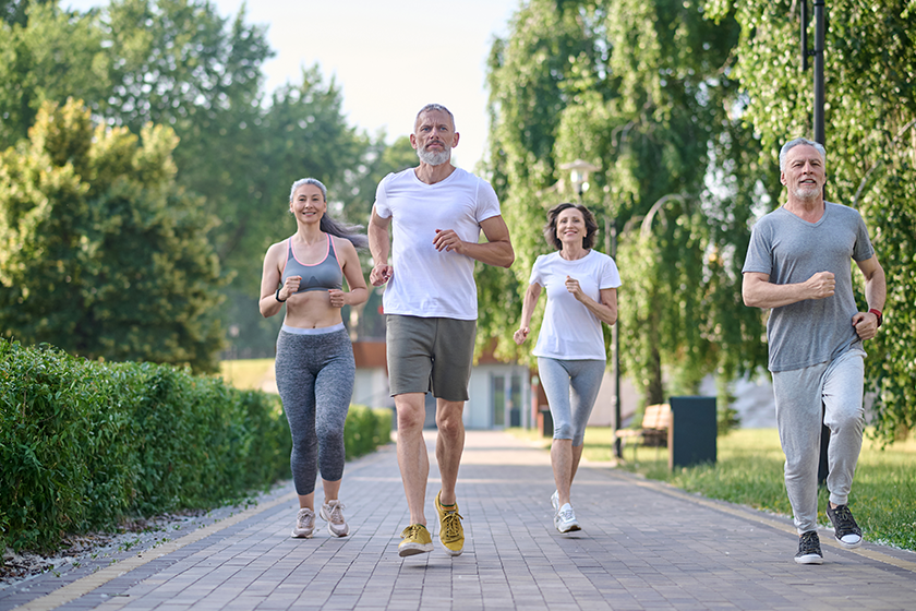 Healthy group of people jogging in park