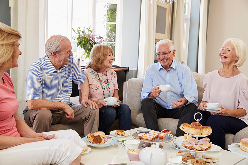 senior-friends-enjoying-afternoon-tea